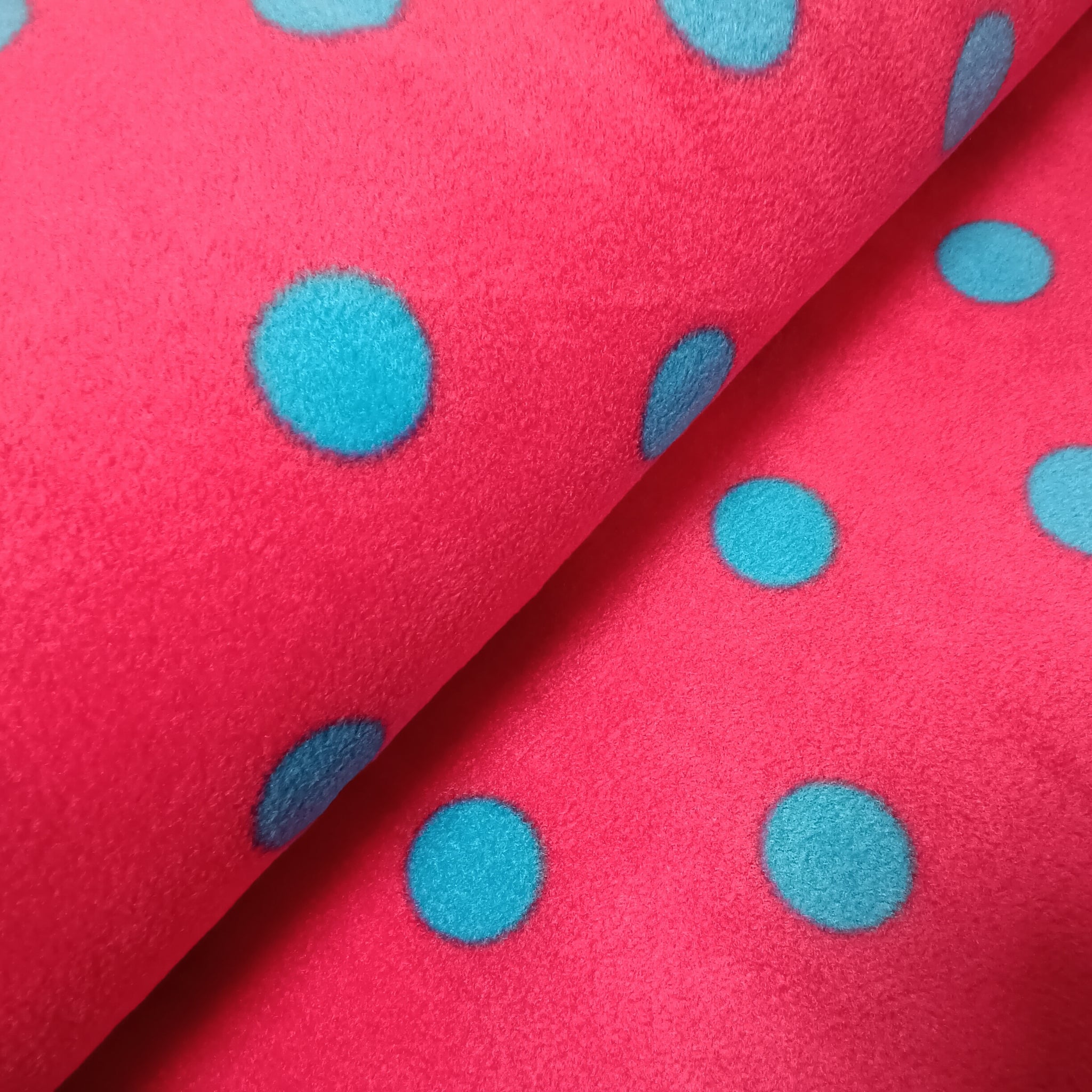 Fleece pink mit blauen Punkten